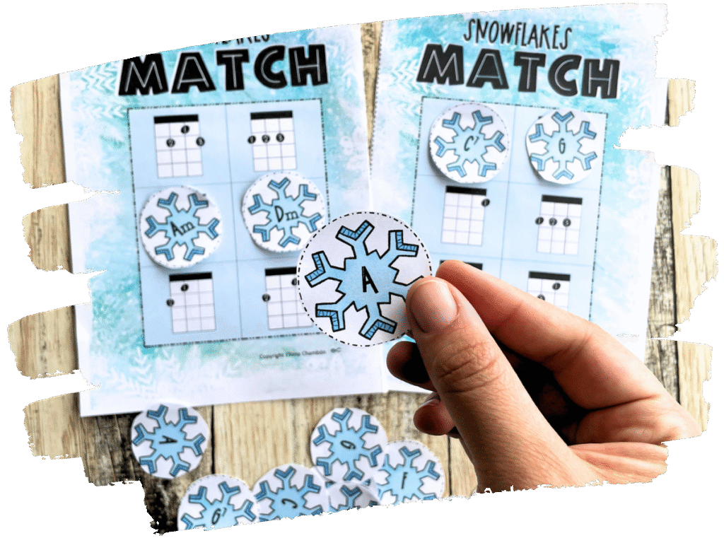 Students playing the Ukulele Snowflake Bingo Game in music class.